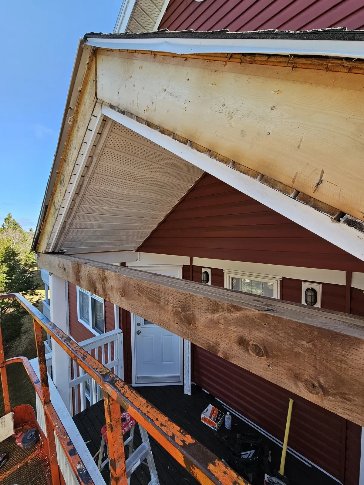 Boom lift on site during exterior repairs