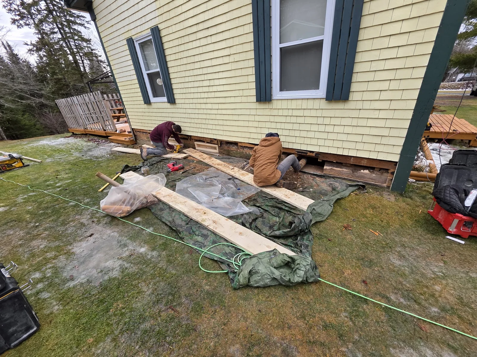 Exterior wall opened up to expose rotted framing