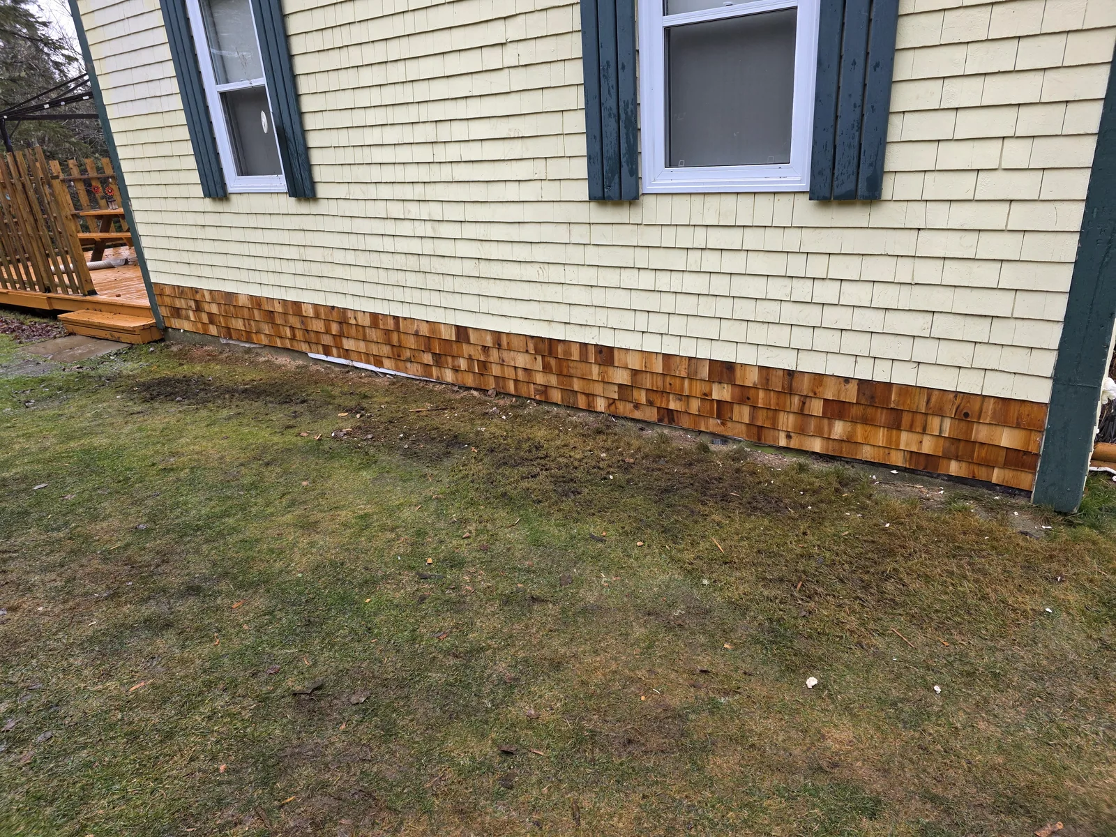 New framing and protective membrane installed on the repaired wall